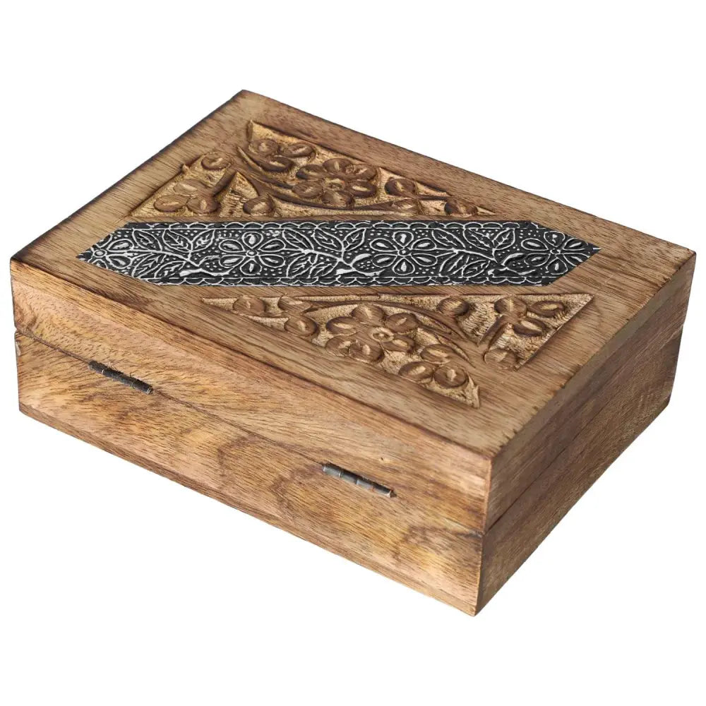 Alt Tag: Elegant wooden jewelry box with intricate carvings, representing luxury and spiritual harmony, crafted by Sylvia Crystals.