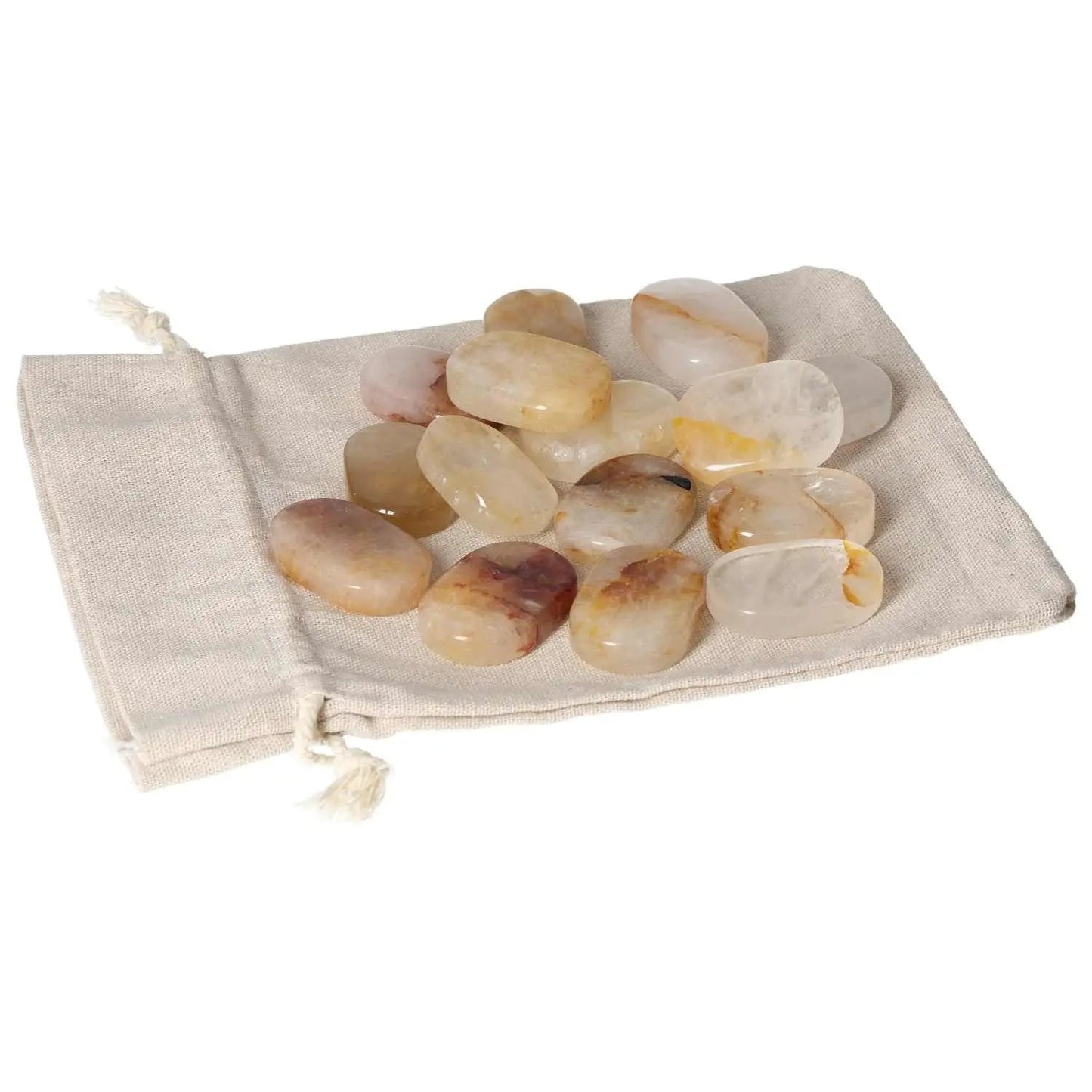 Yellow Hematoide crystals on a cloth bag, ideal for stress relief and grounding therapy.