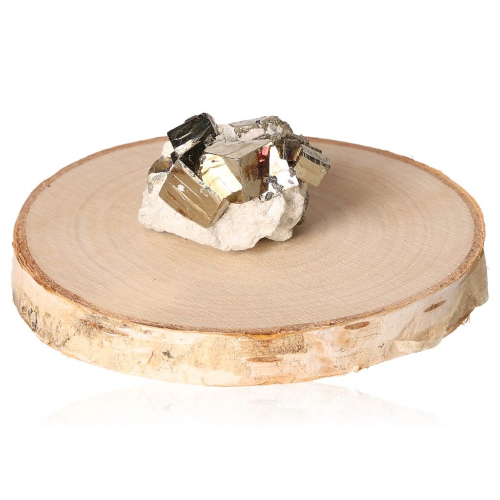 Pyrite druze crystal on natural wood slab, promoting independence and creativity. Perfect for encouraging initiative and goal achievement.