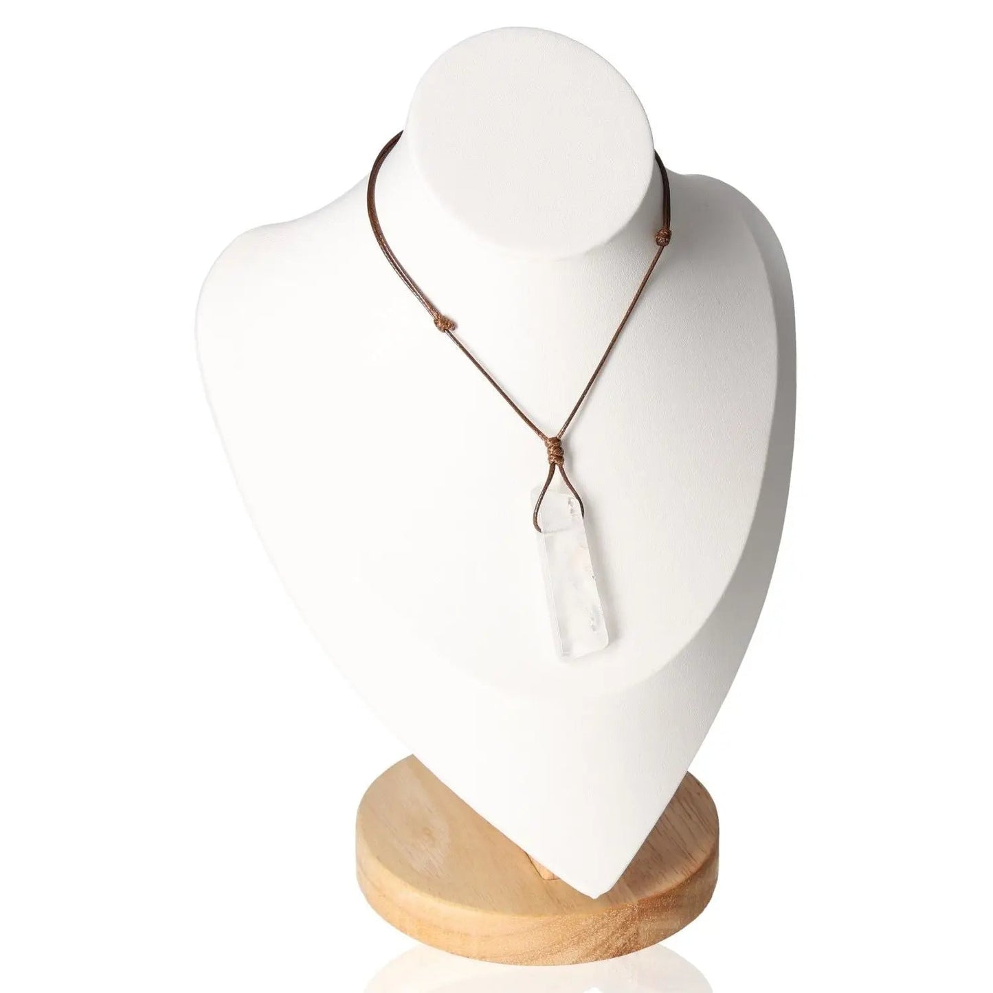 Boho Necklace with Clear Quartz pendant on white display, symbolizing tranquility and bohemian elegance for style enhancement and wellbeing.