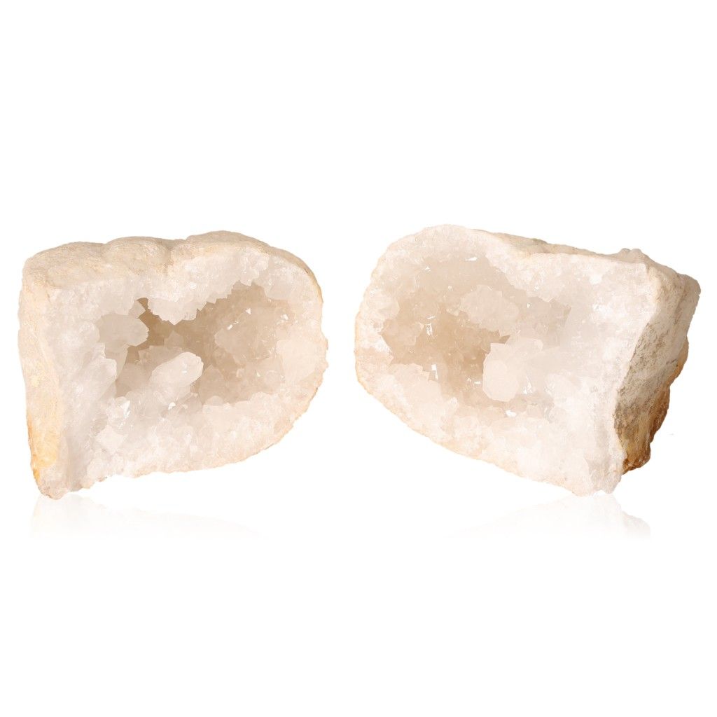 Milky quartz geode with rugged exterior and sparkling white crystals, known for energy cleansing and promoting tranquility.