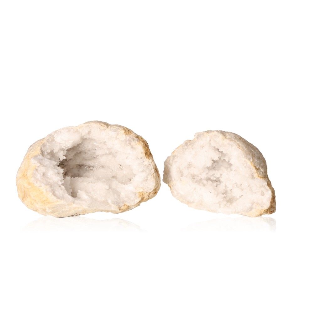 Milky quartz geode split open, revealing cloudy white crystals and rugged, earthy exterior, enhancing tranquility and positive energy.