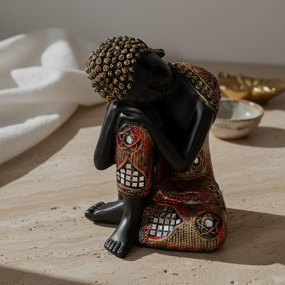 Schwarzer und goldener Buddha