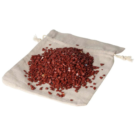 Pile of Jasper Red crystals on a cloth bag, showcasing rich earthy hues, part of Sylvia Crystals premium collection, 1kg 5000 pcs.