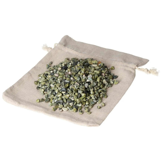 Jadeite 1kg 5000 pcs on beige pouch, featuring natural green gemstones designed for luxury and spiritual harmony from Sylvia Crystals.