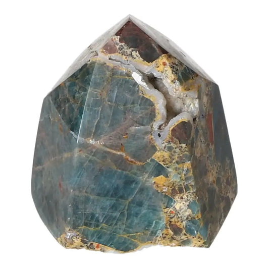 Exquisite Apatite Obelisk from Sylvia Crystals, showcasing luxury, beauty, and spiritual energy benefits. Perfect for transformation.