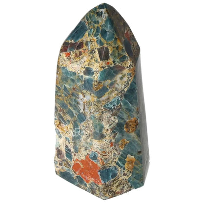 Apatite Obelisk from Sylvia Crystals, showcasing vibrant blue hues and natural patterns, epitomizing elegance and spiritual essence.