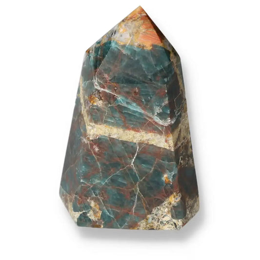 Vibrant blue Apatite Obelisk from Sylvia Crystals, symbolizing clarity and spiritual awareness, balancing spirit and matter.
