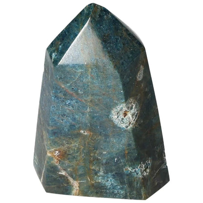 Apatite Obelisk by Sylvia Crystals, elegant decorative piece enhancing clarity and focus, natural blue gemstone.