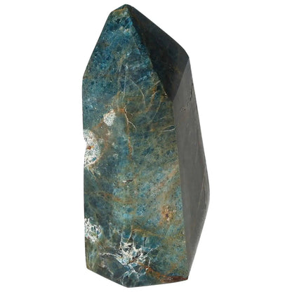Elegant Apatite Obelisk by Sylvia Crystals, featuring vibrant blues and greens for clarity and focus enhancement in any space.