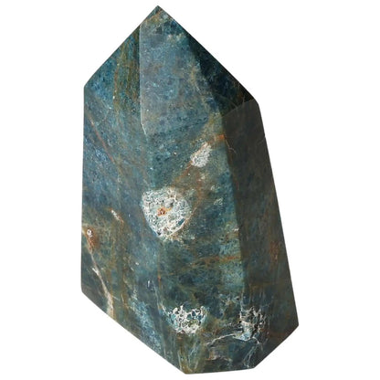 Apatite Obelisk from Sylvia Crystals, a premium decorative piece symbolizing clarity, focus, and vibrant energy in a luxurious setting.