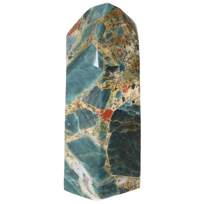 Elegant Apatite Obelisk by Sylvia Crystals, featuring exquisite craftsmanship and vibrant patterns for style and spiritual energy.