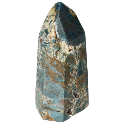 Apatite Obelisk from Sylvia Crystals, showcasing exquisite craftsmanship and vibrant blue-green hues. Ideal for energy and healing.