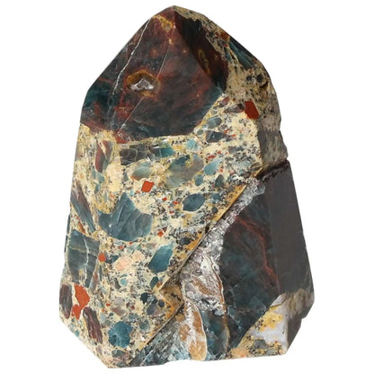 Apatite Obelisk from Sylvia Crystals with stunning blue hues, known for clarity and inspiration, perfect blend of luxury and spirituality.