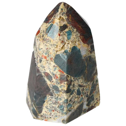 Apatite Obelisk with vibrant blue hues, handpicked by Sylvia Crystals, showcasing luxury and spiritual transformation properties.