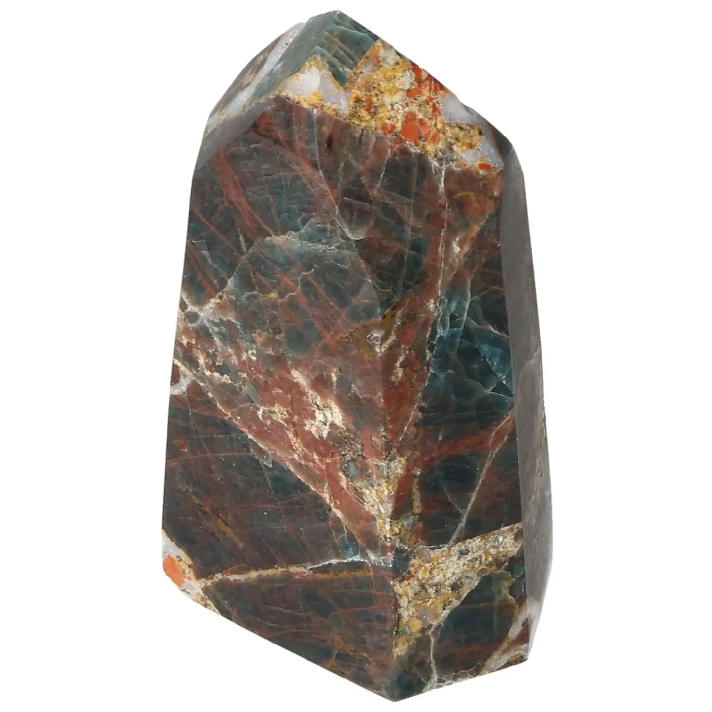 Apatite Obelisk by Sylvia Crystals showcasing rich hues and spiritual energy, a symbol of luxury and conscious living.