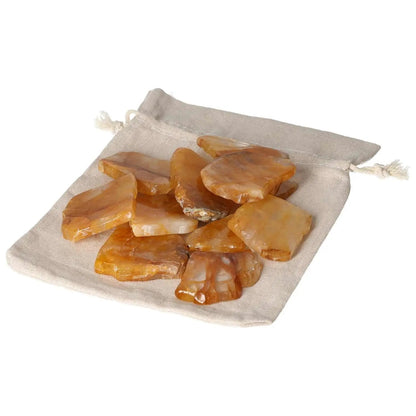 Hematoide Yellow Slice 0.5 kg 15 pcs on linen pouch, Sylvia Crystals, premium handpicked stones for energy and consciousness enhancement.
