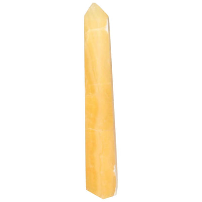 Mexican Calcite Obelisk from Sylvia Crystals, enhancing motivation and personal growth. Elegant yellow crystal centerpiece.