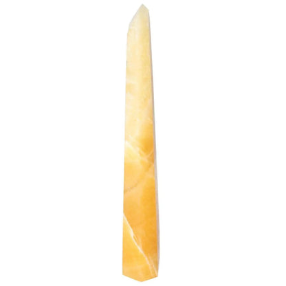 Elegant Mexican Calcite Obelisk from Sylvia Crystals, known for boosting self-confidence and supporting personal growth and success.