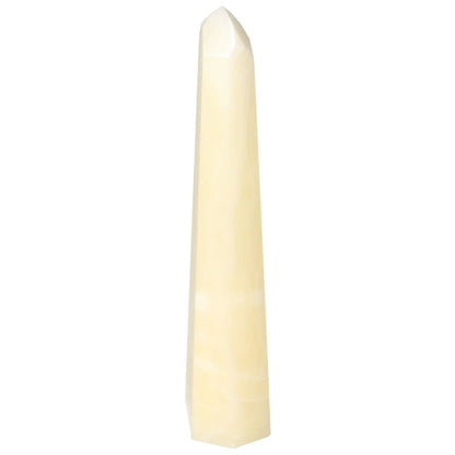Mexican Calcite Obelisk by Sylvia Crystals, a handpicked stone enhancing spiritual harmony and positive energy in ivory sheen.