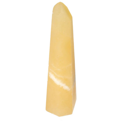Mexican Calcite Obelisk from Sylvia Crystals, symbolizing luxury and quality, perfect for enhancing aesthetics and conscious living.