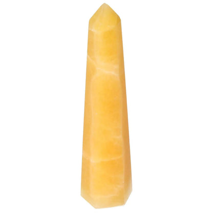 Mexican Calcite Obelisk by Sylvia Crystals, artisan-crafted spiritual tool for enhancing self-confidence and goal achievement.