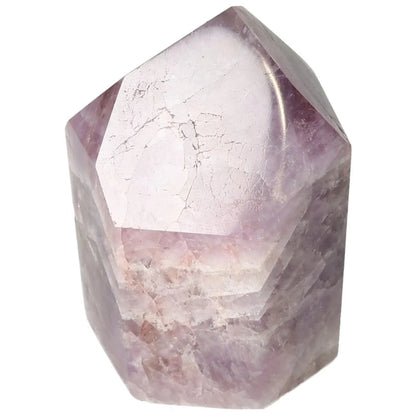 Seven Point Polished Amethyst gemstone by Sylvia Crystals, known for reducing stress and enhancing concentration.