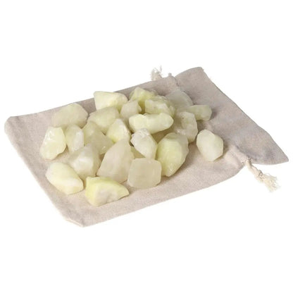 Premium Tumbled Sulphur crystals on a fabric pouch, showcasing vibrant yellow hues for cleansing and spirituality from Sylvia Crystals.