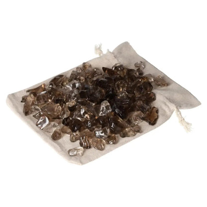 Tumbled Smoky Quartz crystals on a linen bag, perfect for grounding and practical thinking, ideal for professionals.