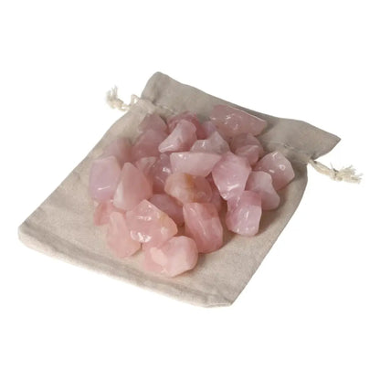Premium Tumbled Rose Quartz stones on a beige pouch, embodying love and healing, from Sylvia Crystals collection.
