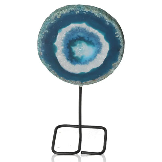 Blue agate slice on metal stand showcases natural elegance and unique design for home decor.
