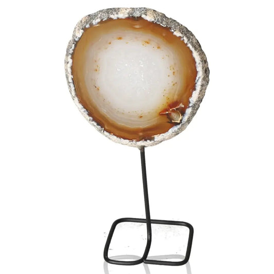 Polished agate slice on metal stand, enhancing harmony and serene ambiance in your living space.