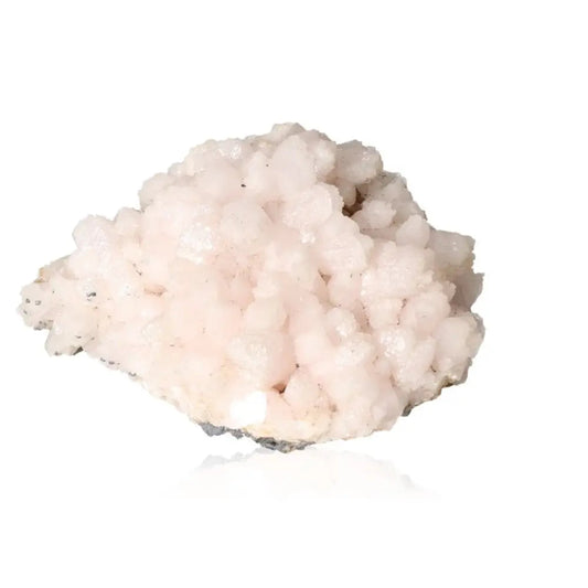 Soft pink Mangano Calcite crystal promoting love, compassion, and emotional healing; known as the Stone of Forgiveness.