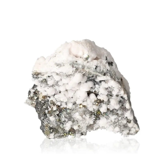 Soft pink Mangano Calcite crystal for love, compassion, and emotional healing, promoting forgiveness and inner peace.