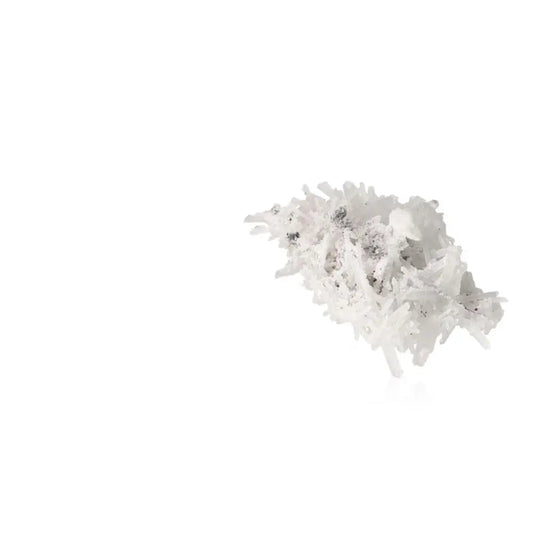 Quartz crystal on white background showcasing pure clarity and sparkling brilliance for energy amplification and mental focus.