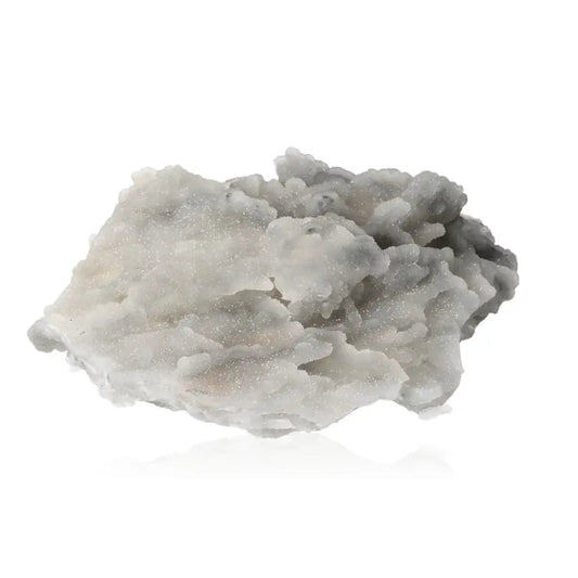 Quartz crystal with pure clarity and sparkle, enhancing energy flow and focusing calm in a serene, harmonious setting.