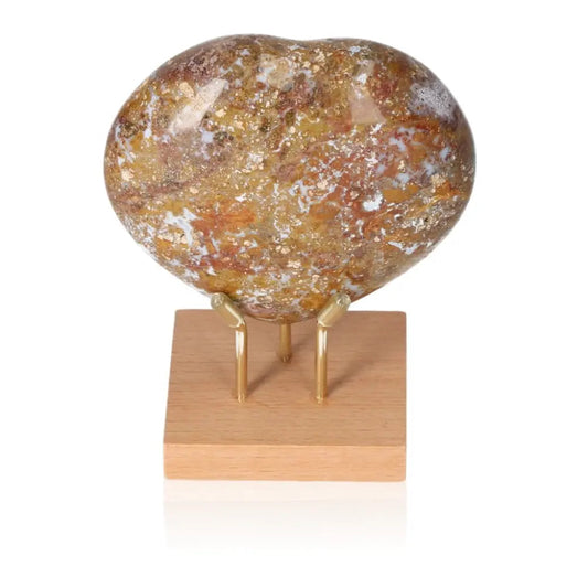 Ocean Jasper Heart gemstone on stand, featuring intricate patterns and calming hues, symbolizing joy, harmony, and emotional balance.