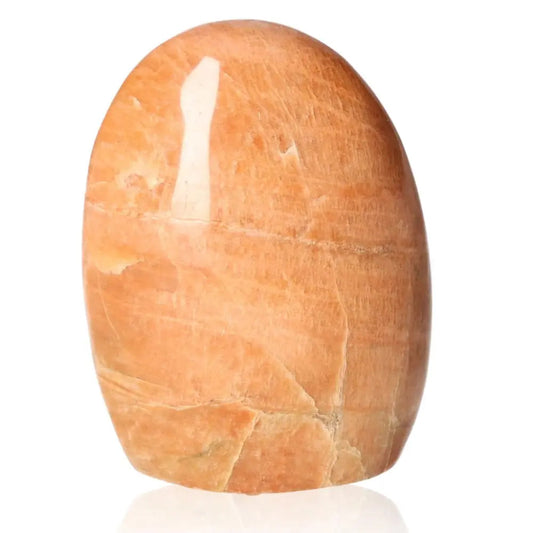 Peach Moonstone Free Form Stone, nurturing with soft peach hue, promotes inner peace and emotional healing, ideal for new beginnings.