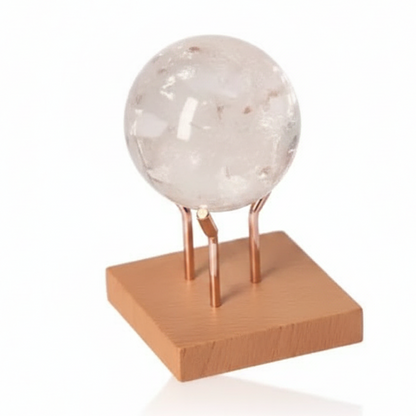 Lemurian Quartz Sphere with clear crystal on wooden stand, enhancing energy flow and tranquility in any space.