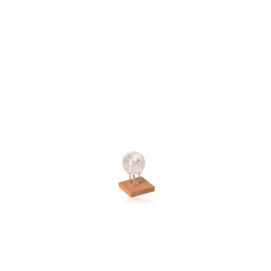 Lemurian Quartz Sphere on a wooden stand, an elegant energy amplifier and mystical decor piece.
