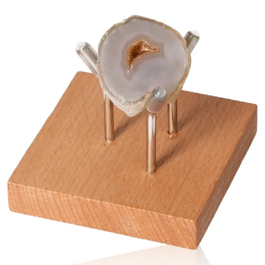 Mini Agate Geode on wooden stand, showcasing natural beauty and spiritual harmony, perfect for home decor and tranquility.