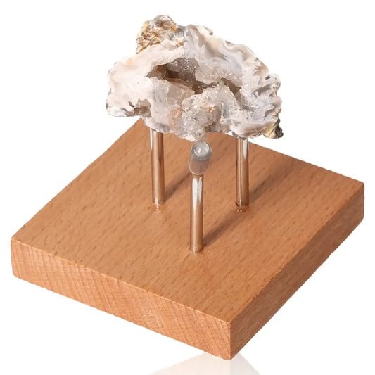 Mini Agate Geode on display stand showcasing natural artistry