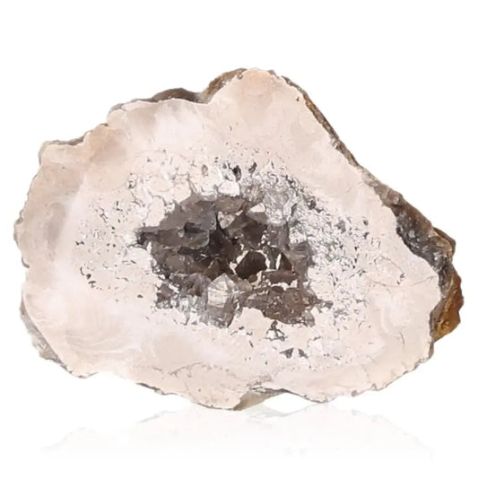 Mini Agate Geode gemstone showcasing natural crystal formations, known for its balancing and grounding energy properties.