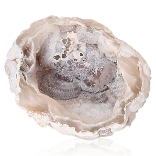 Natural Mini Agate Geode showcasing unique patterns and textures, ideal for energy harmonization and calming home decor.