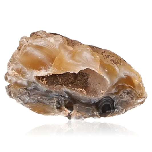 Mini Agate Geode showcasing unique bands and colors, ideal for harmonizing energies and enhancing tranquility in any space.