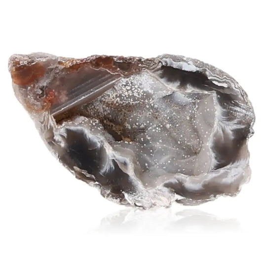 Mini Agate Geode showcasing natural artistry and metaphysical properties for balance and harmony.