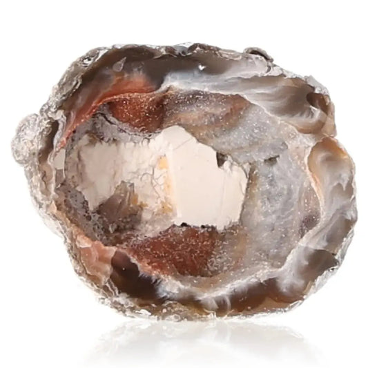 Mini Agate Geode with vibrant hues and delicate crystalline formations, perfect for interior decor and spiritual tranquility.