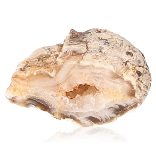 Mini Agate Geode showcasing natural patterns and cavity, perfect for bringing tranquility and balance to your space.