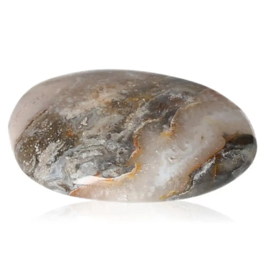 Tumbled Jasper gemstone showcasing natural earthy tones, ideal for promoting harmony and reducing stress on a journey to inner peace.