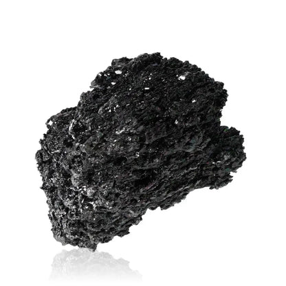 Carborundite or Silicon Carbide mineral, black shimmering surface, known for protection, mental clarity, and spiritual strength.